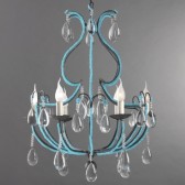 Baroque chandelier revisited with strings of turquoise pearls of Murano glass